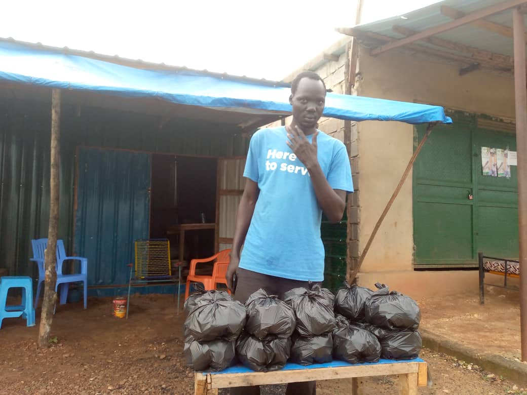 Gal Gony Gatluak displaying packaged charcoal for sale