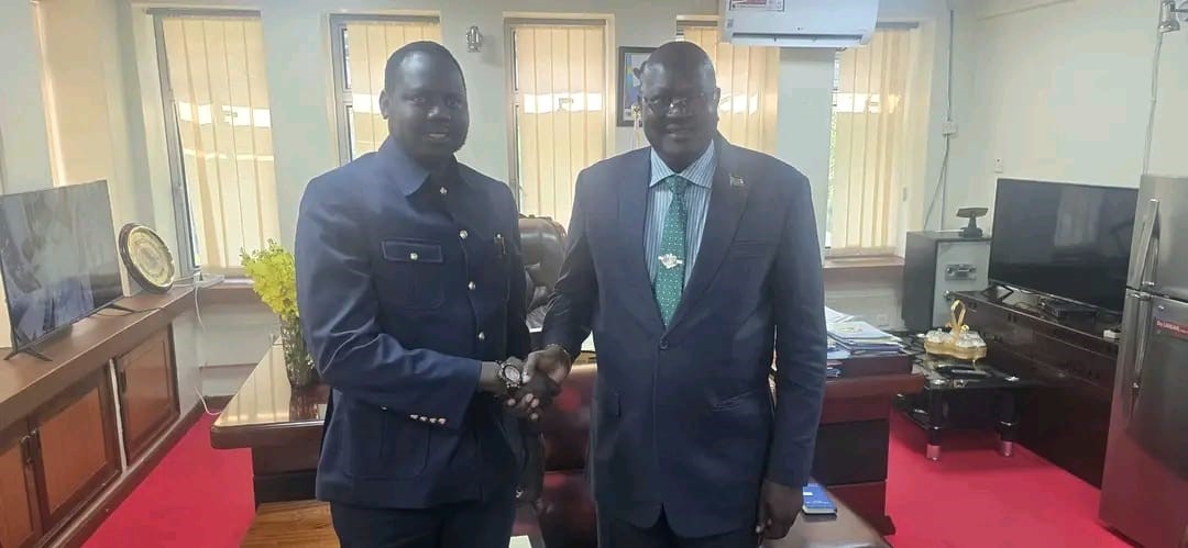 Caretaker Information Minister, Ateny Wek Ateny (Right) shake hands with Reech Ring Bol, Managing Director of National Social Insurance Fund (Left) after meeting in Juba (Photo by Simon Deng)