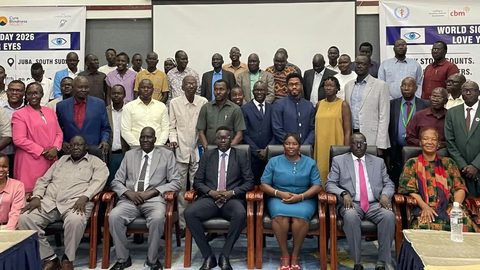 Government officials and partners pose during the celebration. Photo courtesy