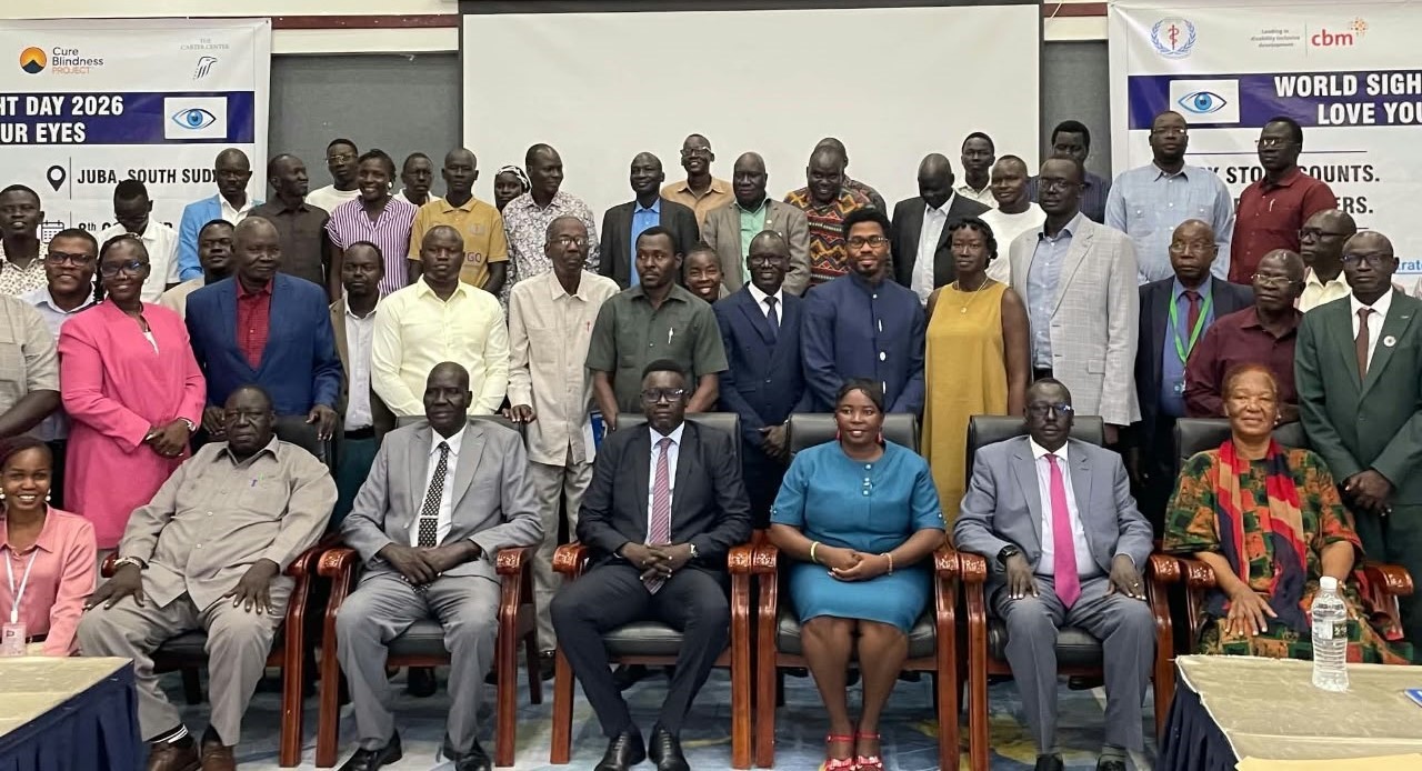 Government officials and partners pose during the celebration. Photo courtesy