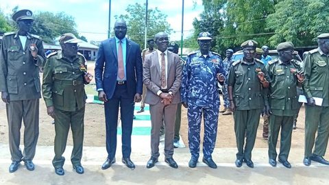 Caretaker Interior Minister, Rizik Zachariah Hassan in middle with officers of National Prison Services during inspection on Tuesday (Photo by Jenifer James)